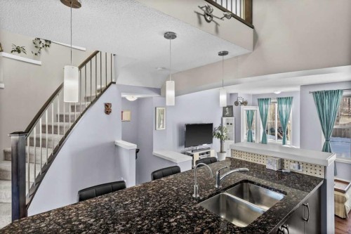 162 Auburn Crest Way Se, Calgary, AB - Indoor Photo Showing Kitchen With Double Sink