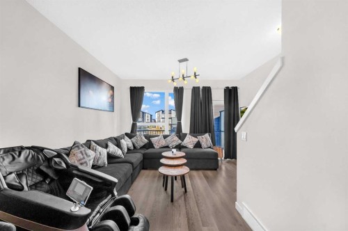 136-301 Redstone Boulevard Ne, Calgary, AB - Indoor Photo Showing Living Room