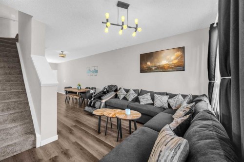 136-301 Redstone Boulevard Ne, Calgary, AB - Indoor Photo Showing Living Room