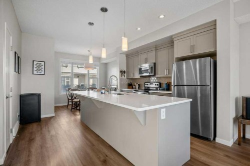 209 New Brighton Walk Se, Calgary, AB - Indoor Photo Showing Kitchen With Upgraded Kitchen
