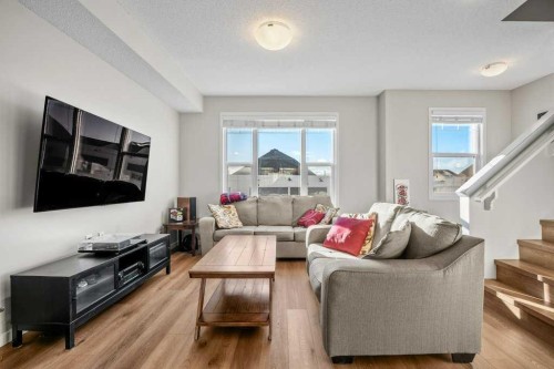 209 New Brighton Walk Se, Calgary, AB - Indoor Photo Showing Living Room