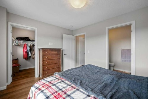 209 New Brighton Walk Se, Calgary, AB - Indoor Photo Showing Bedroom