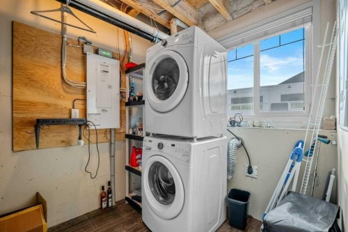 209 New Brighton Walk Se, Calgary, AB - Indoor Photo Showing Laundry Room