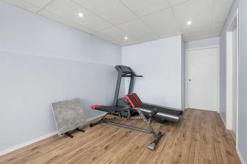 118 Bridleridge Way Sw, Calgary, AB - Indoor Photo Showing Gym Room