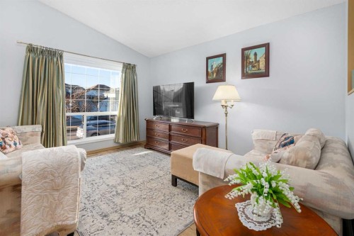 118 Bridleridge Way Sw, Calgary, AB - Indoor Photo Showing Living Room