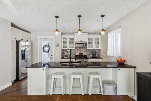 79 Riverglen Way Se, Calgary, AB - Indoor Photo Showing Kitchen With Upgraded Kitchen