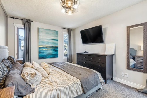 79 Riverglen Way Se, Calgary, AB - Indoor Photo Showing Bedroom