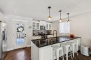 79 Riverglen Way Se, Calgary, AB  - Indoor Photo Showing Kitchen With Upgraded Kitchen 