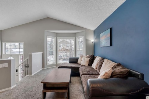 431 Silverado Plains Circle Sw, Calgary, AB - Indoor Photo Showing Living Room
