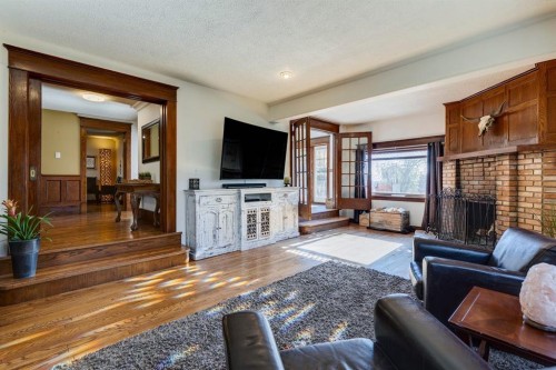 53 Croxford Estates Ne, Airdrie, AB - Indoor Photo Showing Living Room With Fireplace