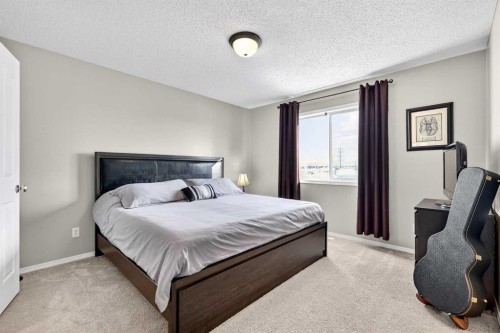 88 Cramond Green Se, Calgary, AB - Indoor Photo Showing Bedroom