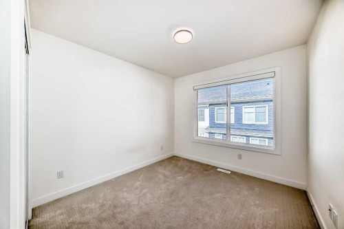 903-135 Belmont Passage Sw, Calgary, AB - Indoor Photo Showing Other Room