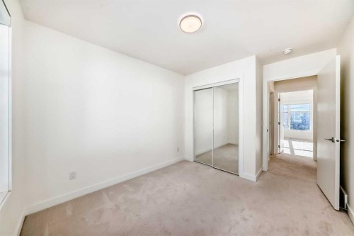 903-135 Belmont Passage Sw, Calgary, AB - Indoor Photo Showing Other Room