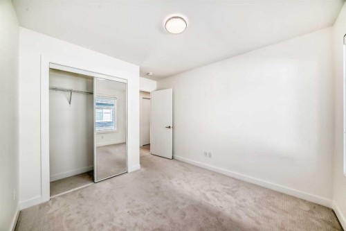 903-135 Belmont Passage Sw, Calgary, AB - Indoor Photo Showing Other Room