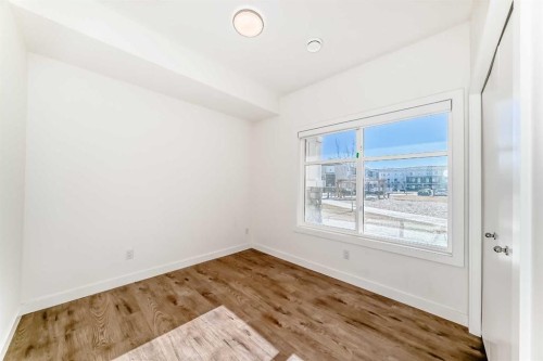 903-135 Belmont Passage Sw, Calgary, AB - Indoor Photo Showing Other Room