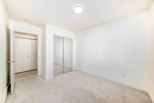 903-135 Belmont Passage Sw, Calgary, AB - Indoor Photo Showing Other Room