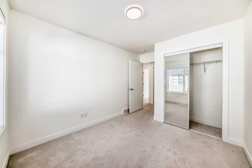 903-135 Belmont Passage Sw, Calgary, AB - Indoor Photo Showing Other Room