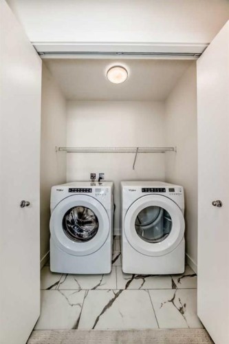 903-135 Belmont Passage Sw, Calgary, AB - Indoor Photo Showing Laundry Room
