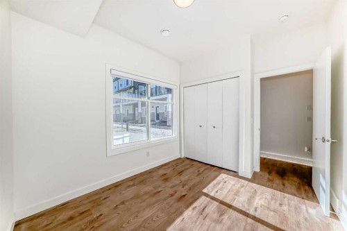 903-135 Belmont Passage Sw, Calgary, AB - Indoor Photo Showing Other Room