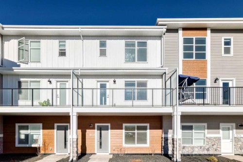 903-135 Belmont Passage Sw, Calgary, AB - Outdoor With Facade