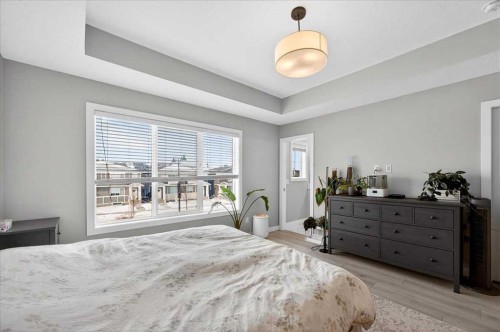 170 Creekside Drive Sw, Calgary, AB - Indoor Photo Showing Bedroom