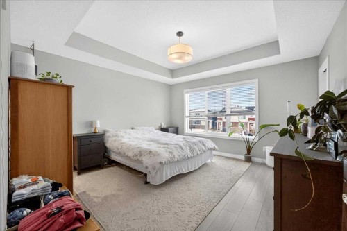 170 Creekside Drive Sw, Calgary, AB - Indoor Photo Showing Bedroom