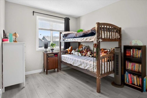 170 Creekside Drive Sw, Calgary, AB - Indoor Photo Showing Bedroom