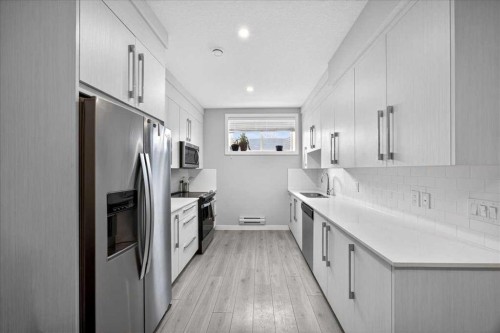 170 Creekside Drive Sw, Calgary, AB - Indoor Photo Showing Kitchen With Upgraded Kitchen