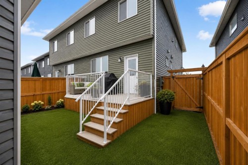 170 Creekside Drive Sw, Calgary, AB - Outdoor With Deck Patio Veranda With Exterior