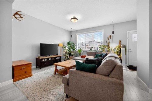 170 Creekside Drive Sw, Calgary, AB - Indoor Photo Showing Living Room