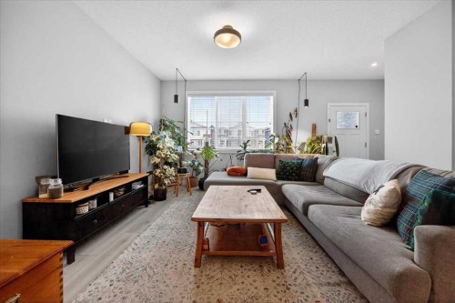 170 Creekside Drive Sw, Calgary, AB - Indoor Photo Showing Living Room