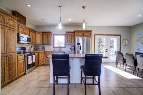 109 Derochie Drive, Claresholm, AB - Indoor Photo Showing Kitchen With Stainless Steel Kitchen