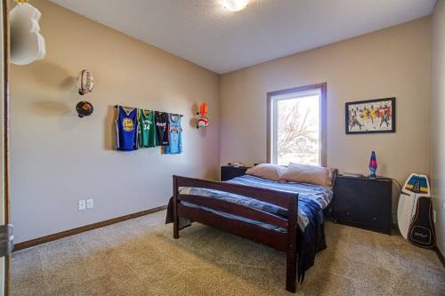 109 Derochie Drive, Claresholm, AB - Indoor Photo Showing Bedroom