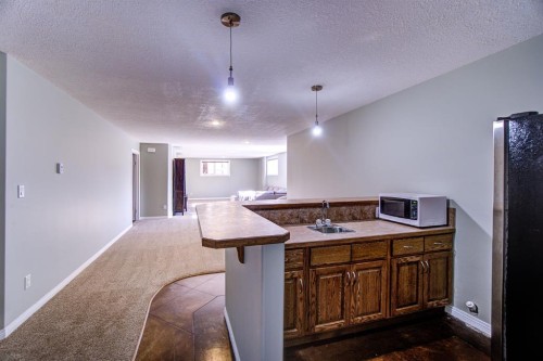 109 Derochie Drive, Claresholm, AB - Indoor Photo Showing Kitchen