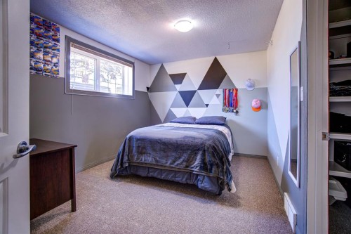 109 Derochie Drive, Claresholm, AB - Indoor Photo Showing Bedroom