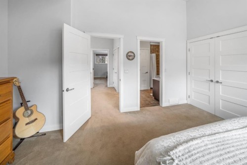 1-105 Rundle Drive, Canmore, AB - Indoor Photo Showing Bedroom