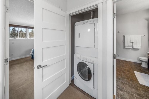 1-105 Rundle Drive, Canmore, AB - Indoor Photo Showing Laundry Room