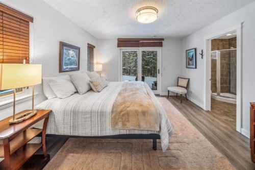1-105 Rundle Drive, Canmore, AB - Indoor Photo Showing Bedroom