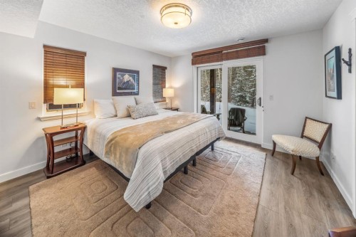 1-105 Rundle Drive, Canmore, AB - Indoor Photo Showing Bedroom