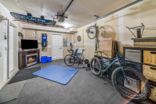 1-105 Rundle Drive, Canmore, AB - Indoor Photo Showing Garage