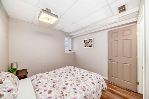 52 Hidden Vale Crescent Nw, Calgary, AB - Indoor Photo Showing Bedroom
