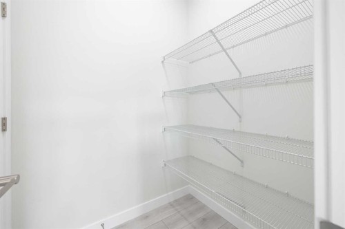 190 Sora Way Se, Calgary, AB - Indoor With Storage