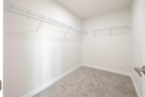 190 Sora Way Se, Calgary, AB - Indoor With Storage