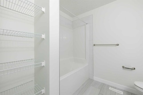190 Sora Way Se, Calgary, AB - Indoor Photo Showing Bathroom