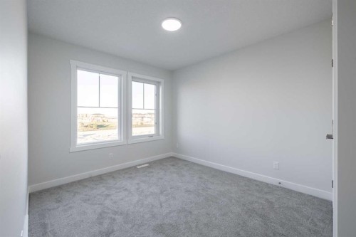 182 Sora Way Se, Calgary, AB - Indoor Photo Showing Other Room