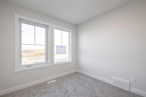 182 Sora Way Se, Calgary, AB - Indoor Photo Showing Other Room