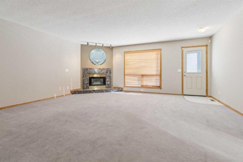 7117 California Boulevard Ne, Calgary, AB - Indoor With Fireplace