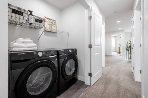 178 Sora Way Se, Calgary, AB - Indoor Photo Showing Laundry Room