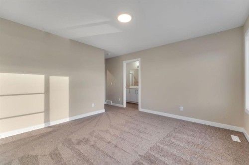 24 Corner Glen Green Ne, Calgary, AB - Indoor Photo Showing Other Room