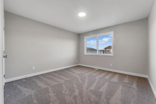 24 Corner Glen Green Ne, Calgary, AB - Indoor Photo Showing Other Room